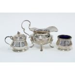 Victorian silver cream jug, Sheffield 1900 and a silver salt with matching silver mustard pot,