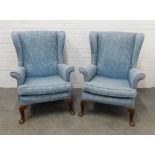 Pair of wingback armchairs with pale blue damask style upholstery, on cabriole legs (2).