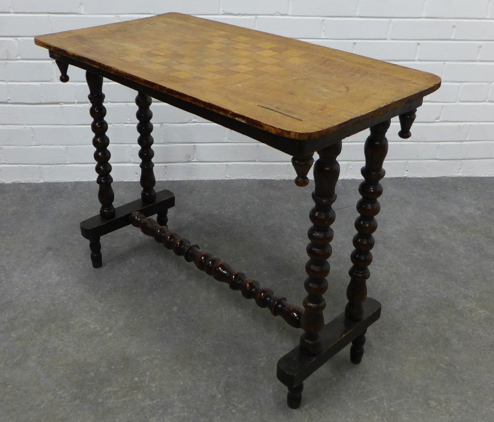 Victorian table with double bobbin legs and stretcher, possibly with a replacement Games table