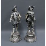 Pair of silvered composite Cavelier figures, height 53cm (2)