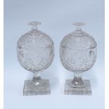 A pair of cut glass confitures with covers, on square bases, (2) 25 x 13cm