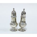 Pair of Victorian silver pepper pots in the form of miniature castors, William Hutton & Sons, London