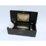 Swiss music box, rosewood and inlaid case, playing eight Airs to include What shall the Harvest be &