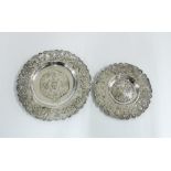 Two Continental silver plates, each with repoussé decoration and one inscribed To Laura 1908', 14.
