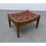 An Arts & Crafts oak and leather stool by Arthur W. Simpson, the concave top with leather lattice,