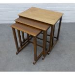 Nest of three teak tables. 54 x 56 x 38cm.