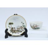 18th century continental porcelain cup and saucer, painted with figures and rustic landscape, red