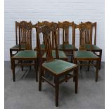 Set of eight Art Nouveau oak chairs with upholstered seats, 103 x 44 x 40cm. (8)
