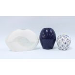 Rhian Malin contemporary porcelain vase in blue and white together with a blue glazed vase and a