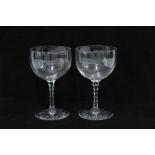 A pair of wheel engraved armorial wine glasses, etched motto of Louis XVI 'nec pluribus imbar', (