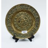 Heavy brass cherub pattern dish, 25cm diameter