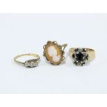 Three 9ct gold rings to include a cameo ring, diamond ring and a sapphire ring (3)