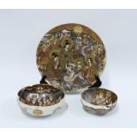 A group of Japanese Satsuma '1,000 Faces' pattern pottery to include a plate and two bowls, with