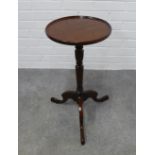 Mahogany pedestal table a circular dished top. 61 x 39cm.