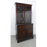Georgian mahogany secretaire cabinet, the top with glazed doors and a shelved interior over a