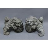 A pair of modern resin Temple Lion figures 24cm long (2)