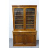 Late 19th / early 20th century oak bookcase cabinet, the top with a pair of glazed doors with a