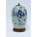 Chinese celadon ground jar and cover with underglaze pattern of blue and white figures , with wooden