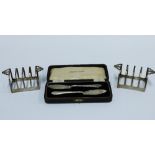Pair of Birmingham silver toast racks by Deakin & Francis and a cased set of two Birmingham silver