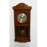 Mahogany cased wall clock, silvered dial and arabic numerals, complete with pendulum . 74 x 33 x