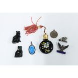 Resurco silver and enamel pin badge, miniature black glass scent bottle two small black cats, etc (a