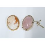 18ct gold framed Cameo brooch3.5cm long, together with a yellow metal brooch with pink polished