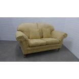 Pale yellow damask upholstered two seater sofa with squab and scatter cushions, on mahogany legs