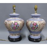 A pair of pottery table lamps with wooden bases, 32cm high excluding fittings, (2) 30cm.