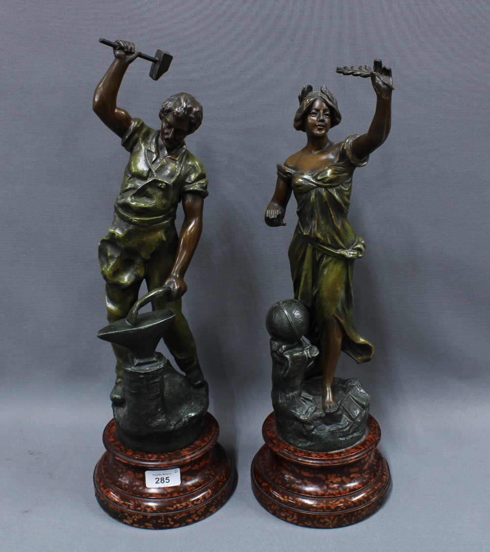 A pair of patinated spelter figures La Science & Le Travail, 51cm tall (2)