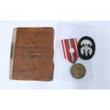 Soldier's Service and Pay Book, Polish Army felt badge and 1938 medal (3)