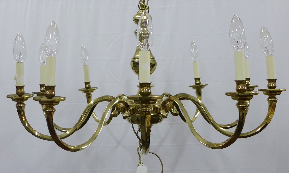 Large & heavy Dutch style brass chandelier, ten scrolling arms with octagonal scones and