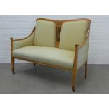 Mahogany and inlaid two seater parlour settee with pale yellow upholstery, 98 x 115 x 58cm.