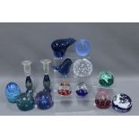 Collection of coloured glass paperweights to include Caithness, etc and a pair of Selkirk Glass