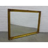 Gilt framed wall mirror. 101 x 72cm.