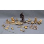 Collection of miniature Japanese wooden figures together with a carved rootwood figure (a lot)