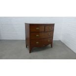 19th century mahogany bow front chest with two short and two long drawers, on ogee bracket feet,
