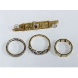 Edwardian 9ct gold bar brooch, 9ct gold gemset ring, 9ct gold eternity ring and a yellow metal