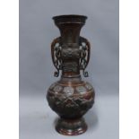 Japanese bronze vase of archaic style with pierced handles and Greek key border rim, 43cm