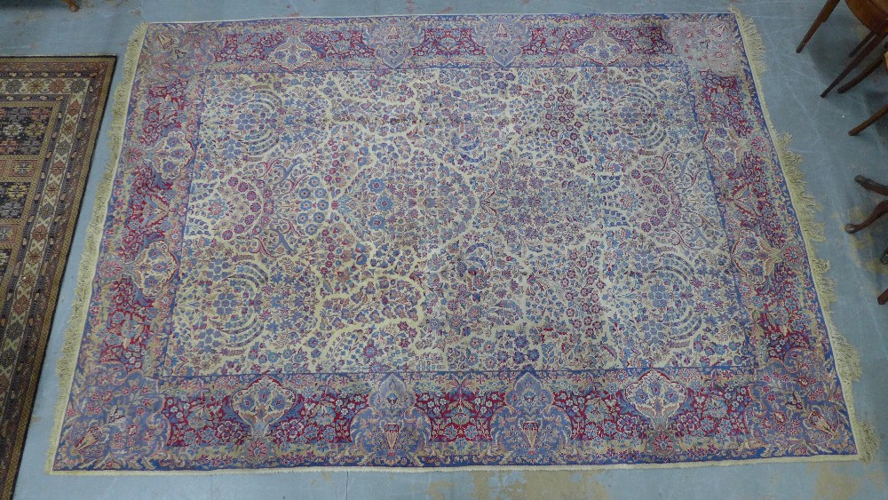 Large Indian carpet, probably Agra, ivory and pale blue field with urns and flowers design, 305 x - Image 2 of 9