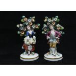 A pair of 19th century male and female bocage figures, gold anchor marks, (2) 13cm.