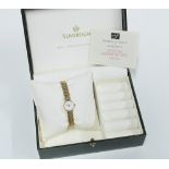 Ladies 9ct gold Sovereign wrist watch on 9ct gold bracelet strap, complete with box