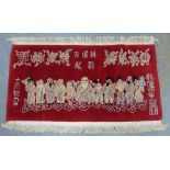 Chinese rug, red field with Immortals and calligraphy. 140 x 80cm.