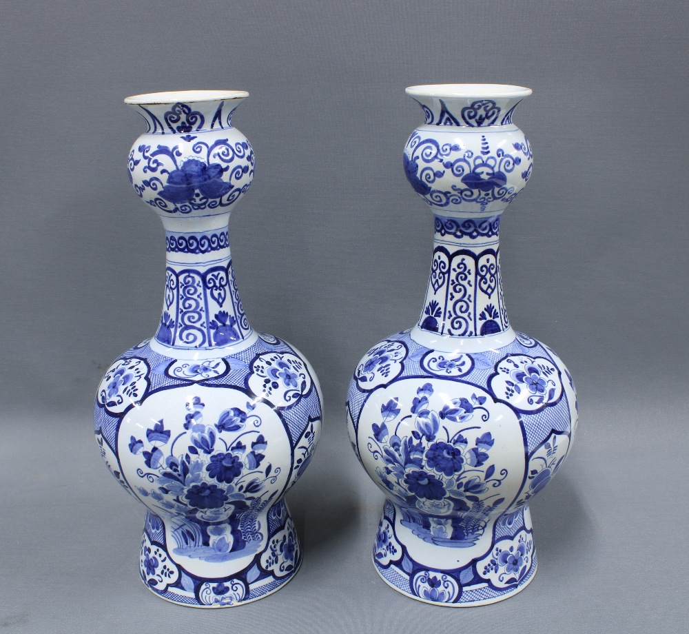 Pair of Delft blue and white gourd vases, 40cm (2)