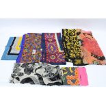 Vintage silk scarves to include Versace, Lagerfeld, Asprey, two Yves Saint Laurent and two