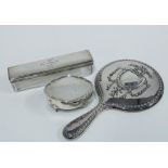 An Edwardian silver backed hand mirror, Birmingham 1909, Victorian silver topped glass box, London