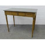 Painted side table with plain rectangular top over a floral painted frieze with central drawer,