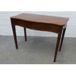 Late 19th century mahogany side / writing table, with lift up serpentine top revealing a void