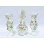 Garniture of Coalbrookdale type floral encrusted vases (a/f) (3) 27cm.