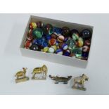 Vintage glass marbles and a group of miniature painted wood animals (a lot)