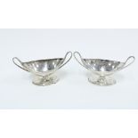 George III silver navette salt with London 1790 hallmark together with another in white metal of the